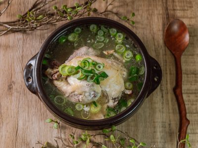 Samgyetang, Korean Ginseng Chicken Soup : Tender, whole, young chicken stuffed with ginseng, jujubes, sweet rice, and whole garlic cloves and simmered until tender. The combination of chicken and ginseng creates a complex yet harmonious flavor. This is a classic summertime dish that revitalizes the body and soul.