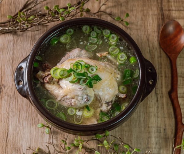 Samgyetang, Korean Ginseng Chicken Soup : Tender, whole, young chicken stuffed with ginseng, jujubes, sweet rice, and whole garlic cloves and simmered until tender. The combination of chicken and ginseng creates a complex yet harmonious flavor. This is a classic summertime dish that revitalizes the body and soul.